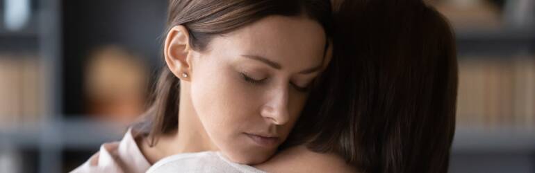 woman being empathetic hug